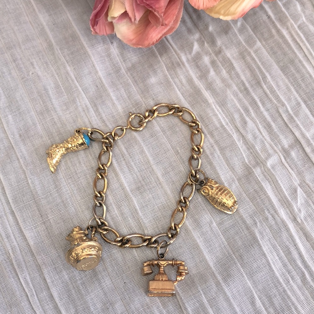 Vintage 1973 AVON Victorian Charms gold tone charm bracelet 7.25"